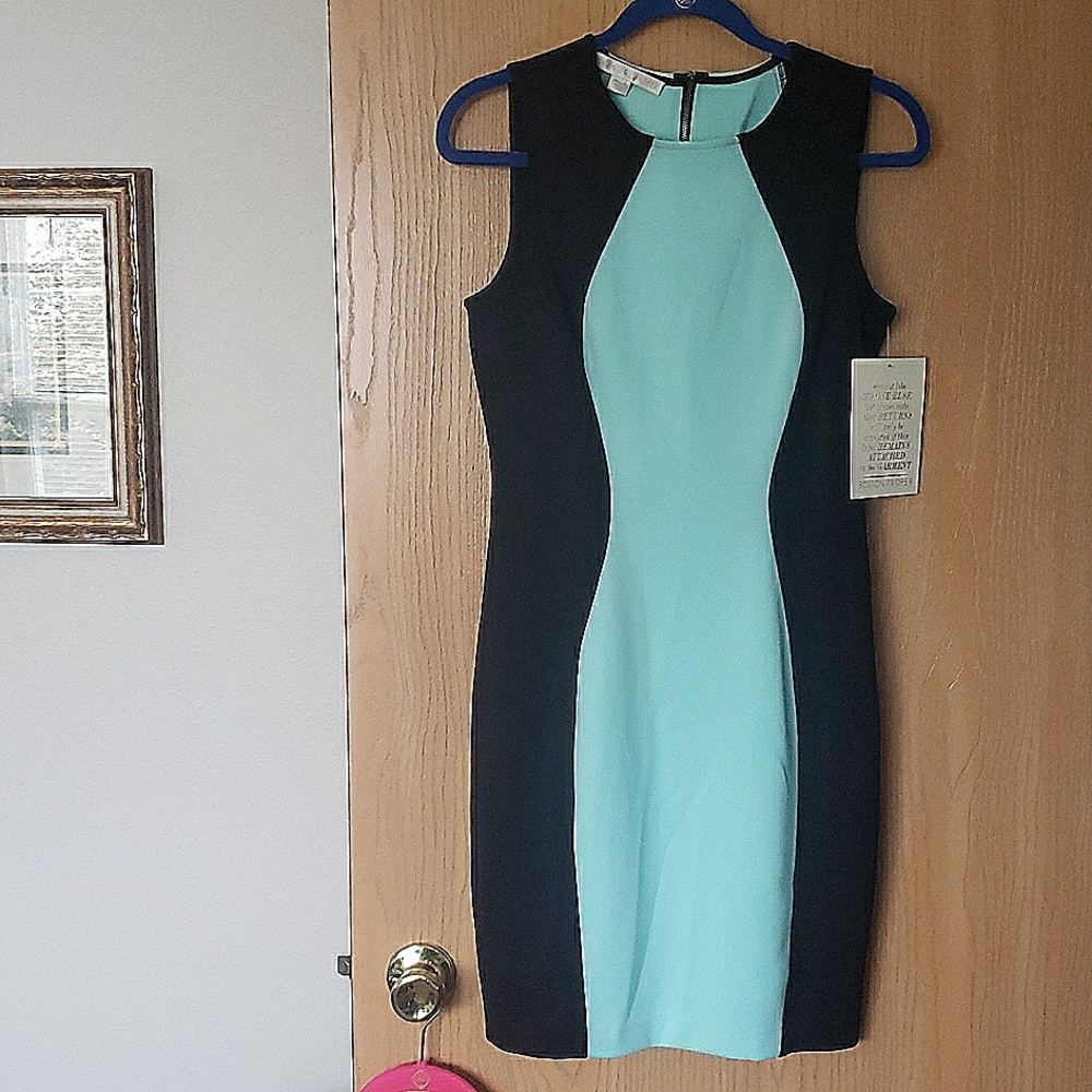 New with tag Boston Proper Scuba dress size 10.  Aqua and black.